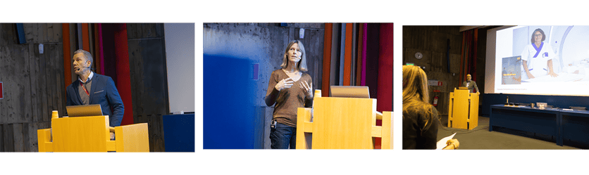 En man och en kvinna står på scen och talar vid podium